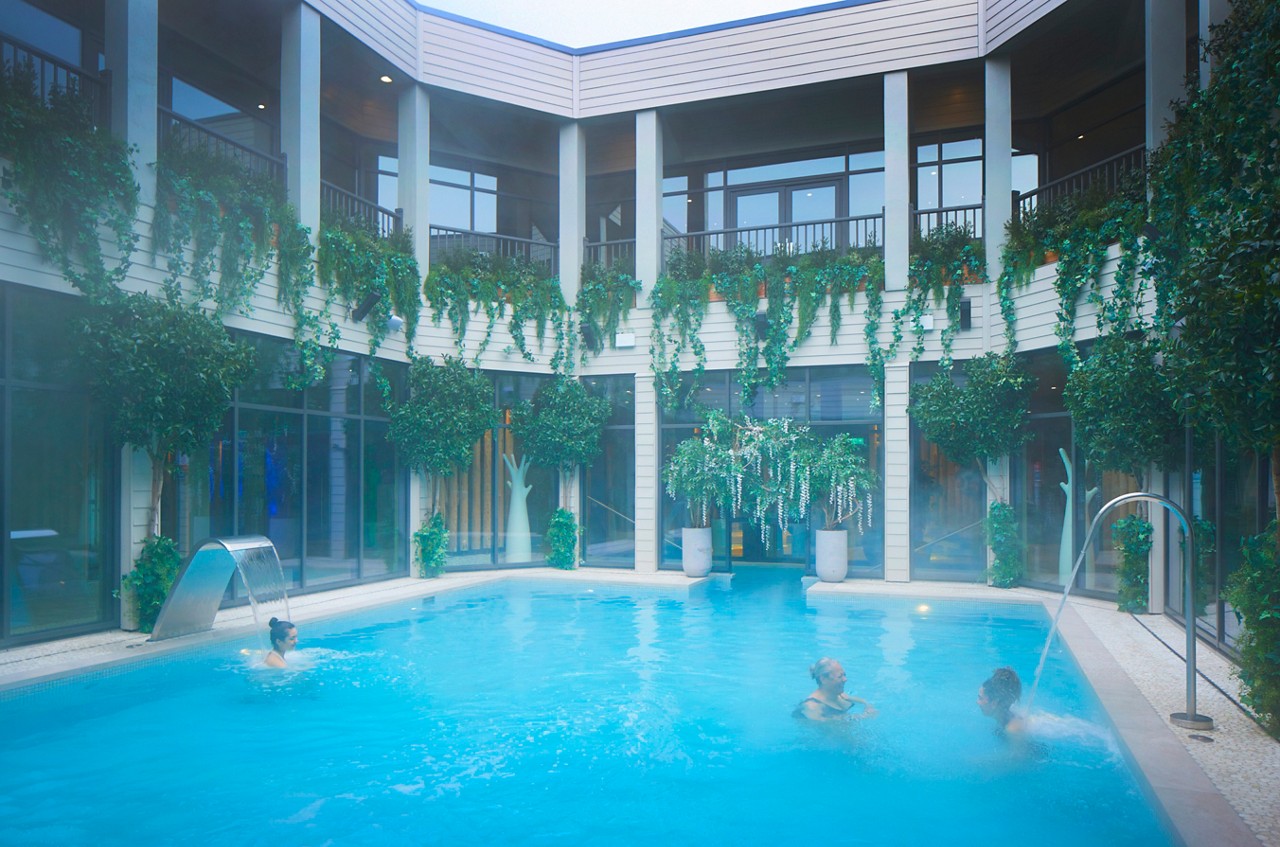 people in the outdoor pool